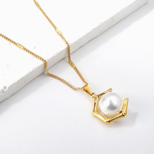 Pearl Grasp – Bamboo Cage Pendant Necklace